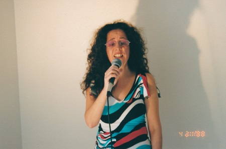 front shot from waist heigh singing