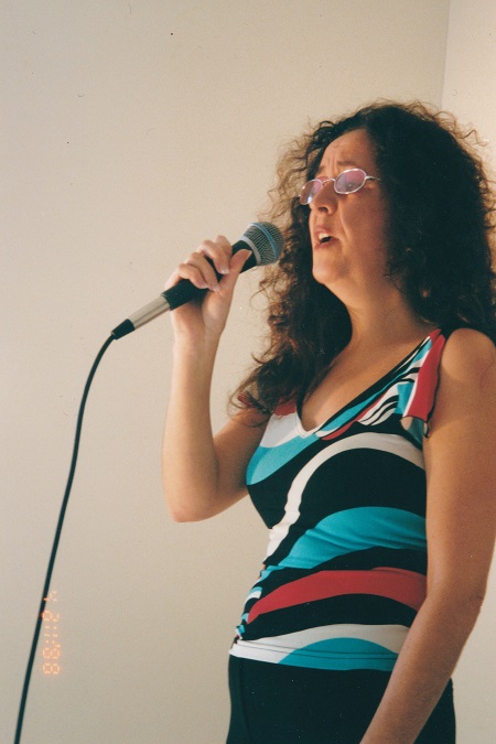 side on shot from thigh heigh up singing